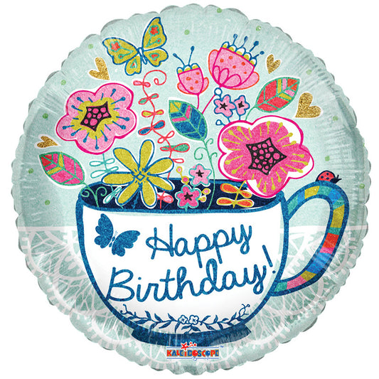 Taza y flores de cumpleaños de relaciones públicas