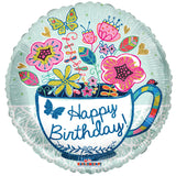 Taza y flores de cumpleaños de relaciones públicas