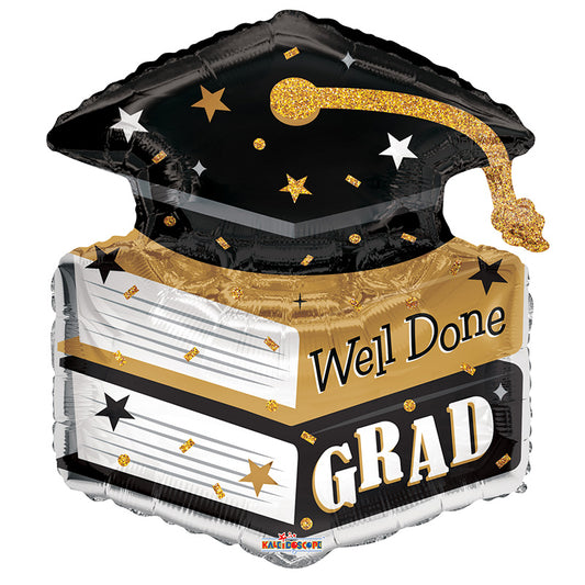 Libros de relaciones públicas y gorra de graduación